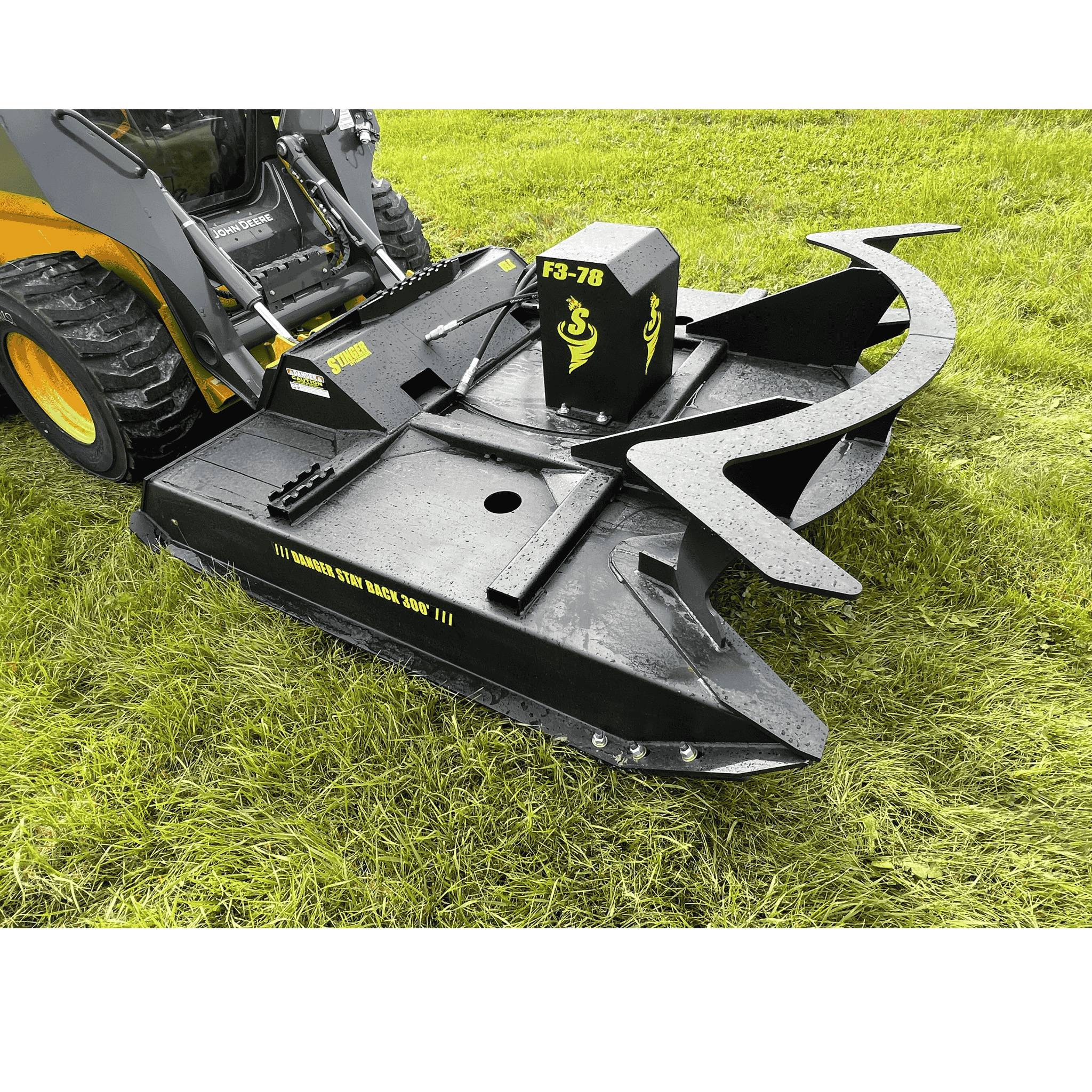 Stinger Twister F2 skid steer brush cutter mounted for land clearing