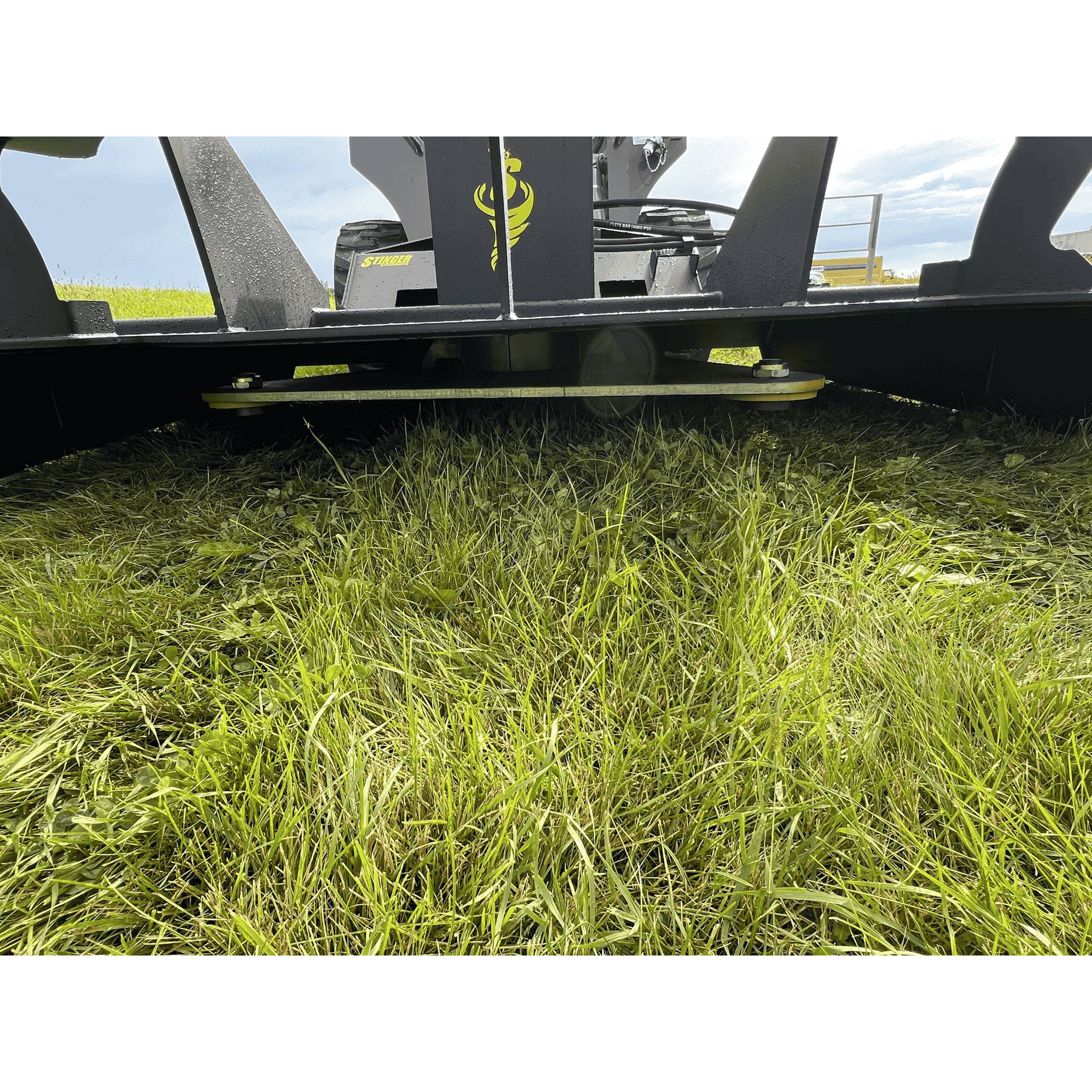 Stinger Twister F2 skid steer brush cutter mounted for land clearing